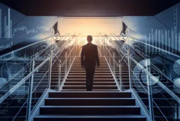 cso_nw_leadership_sucess_businessman_ascending_staircase_surrounded_by_symbols_of_business_acumen_by_metamorworks_gettyimages-957655008-100801476-large